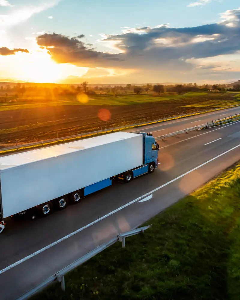 Articulated lorry on a UK motorway — used diesel engines despatched from stock